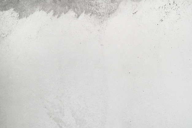 Textura de fundo de concreto rebocado branco cimento cinza sujo com design abstrato de cor cinza é leve com fundo de parede branca