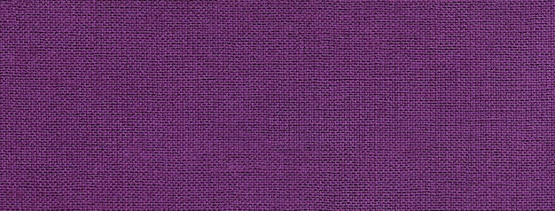 Textura de fundo de cor violeta escura de material têxtil com padrão de vime Tecido lavanda vintage