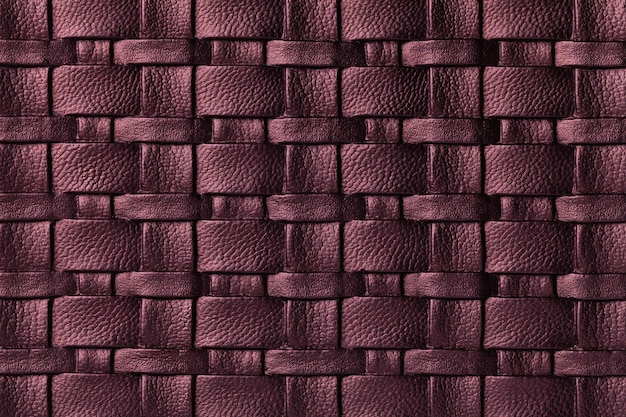 Textura de fundo de couro roxo escuro com padrão de vime