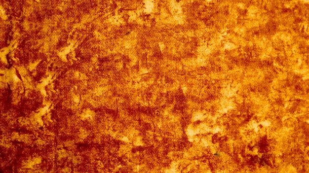 Textura de fundo de grunge de lona marrom. Fundo marrom texturizado manchado bonito e brilhante. Detalhe do close up de um fundo de textura de tecido marrom.