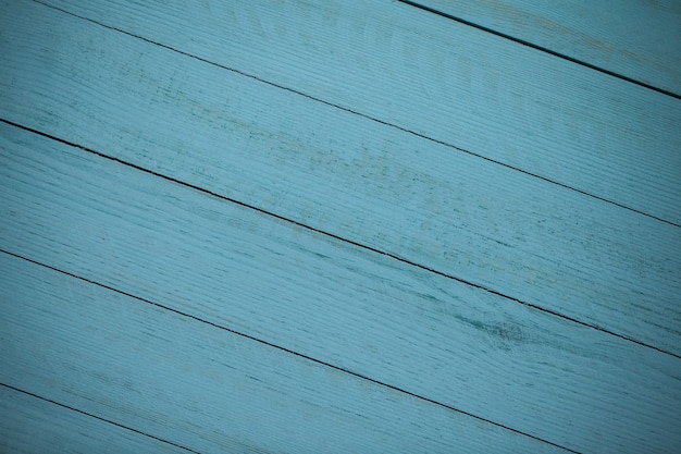 Textura de fundo de madeira azul vintage com nós e orifícios de pregos. Parede de madeira pintada velha.