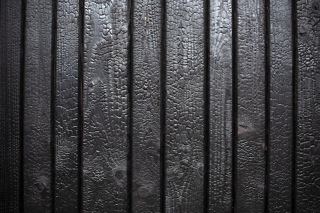 Foto textura de fundo de madeira queimada tábuas de madeira queimadas fechadas shosugiban yakisugi método tradicional japonês de preservação de madeira