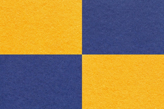 Textura de fundo de papel amarelo e azul marinho com padrão de células macro vintage denso kraft cartão dourado