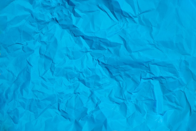 Textura de fundo de papel azul amassado