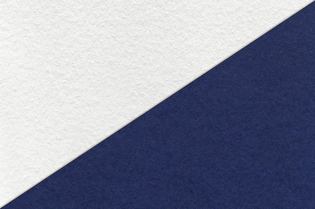 Textura de fundo de papel branco e azul marinho metade de duas cores Estrutura de papelão denim kraft vintage