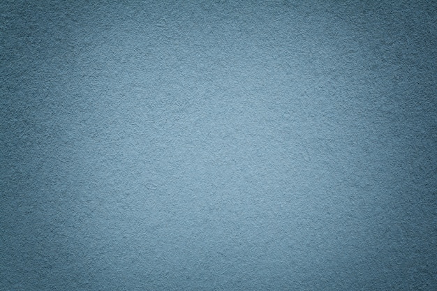 Textura de fundo de papel cinza velho, closeup, estrutura de papelão azul claro denso,