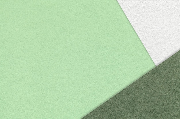 Textura de fundo de papel de cor verde claro artesanal com borda branca e verde-oliva Cartão de menta abstrato vintage