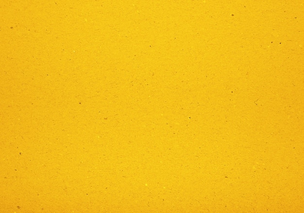 Foto textura de fundo de papel pergaminho de design amarelo vivo com padrão de fibras de feltro escuro