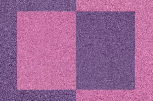 Textura de fundo de papel roxo escuro e lilás artesanal metade de duas cores macro estrutura de papelão artesanal violeta