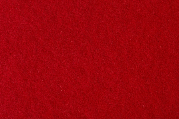 Textura de fundo de papel vermelho. Foto macro