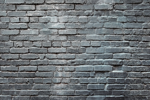 Textura de fundo de parede de tijolo cinza escuro velho