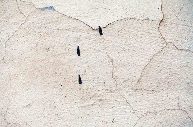 Textura de fundo de superfície de parede de pedra rachada abstrata velho grunge