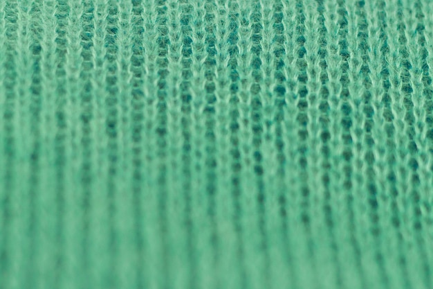 Foto textura de fundo de tecido verde tricotado