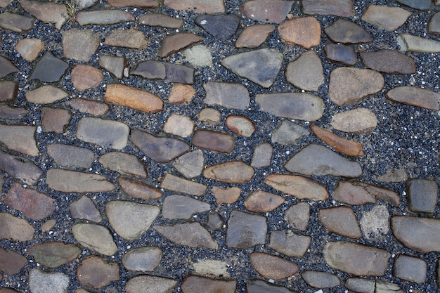 Textura de fundo de tijolos de paralelepípedos de pavimento de pedra