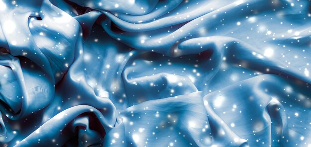 Textura de fundo plano de seda macia azul de férias mágicas com pano de fundo abstrato de beleza de luxo de neve brilhante