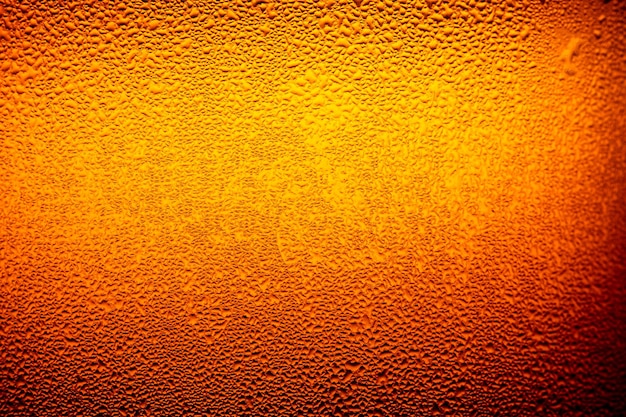 textura de garrafa de cerveja macro Textura de gotas de água na garrafa de cerveja Fundo abstratoGotas de água