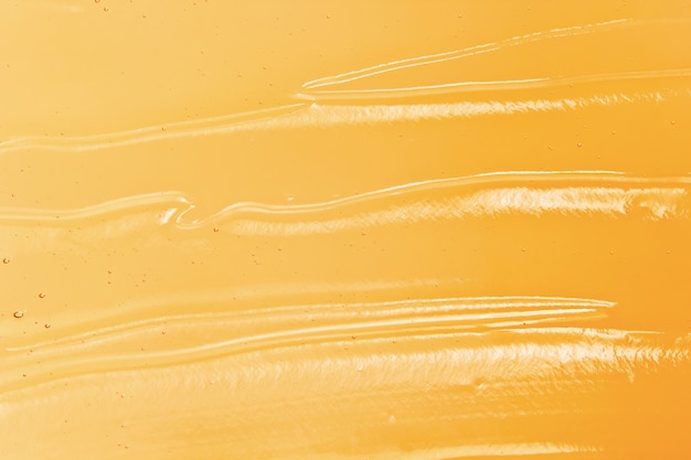 Foto textura de gel cosmético laranja brilhante