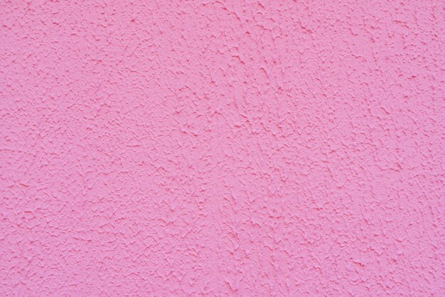 Textura de gesso áspero rosa. Abstrato arquitetônico.