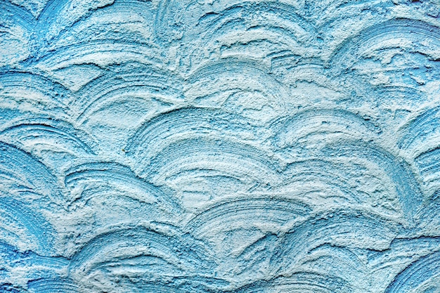 Textura de gesso decorativo, linhas onduladas de cor azul