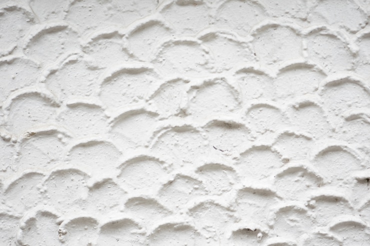 Foto textura de gesso onda branca de fundo da parede de concreto.