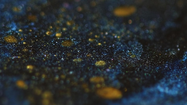 Textura de glitter molhado tinta brilhante azul dourado