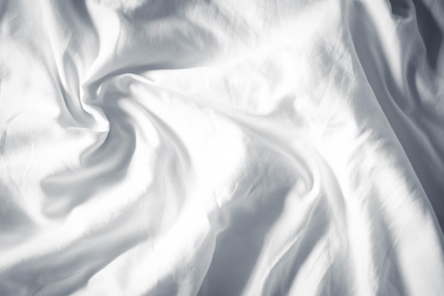 Textura de gradiente de roupa de cama branca estilo de curva desfocada de tecido de luxo abstrato