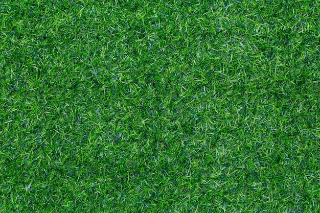 Textura de grama verde para campo de futebol de campo de golfe ou fundo esportivo Design de conceito de grama verde artificial para design com espaço de cópia para adicionar texto ou imagem