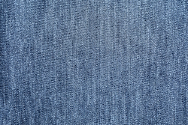 Textura de jeans azul como pano de fundo, espaço para texto