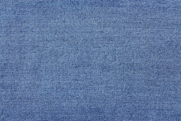 Textura de jeans azul. Fundo de tecido jeans.