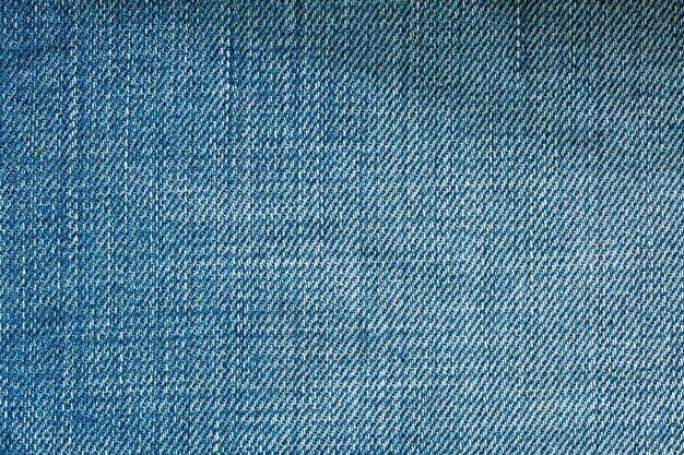 Textura de jeans para uso de fundoImagem de fechamento de textura de fundo de jeans azul