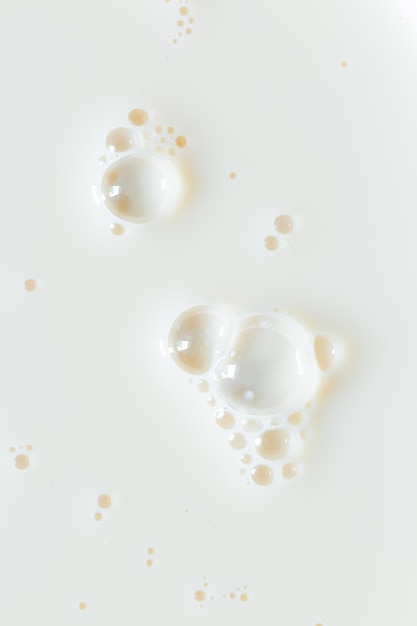 Textura de leite macroSuperfície branca de leite e bolhas e ondulações de cima da vista aérea