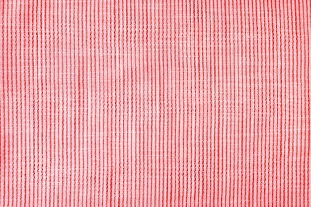 Textura de linho vermelho natural com padrão listrado como papel de parede de fundo Vista superior plana