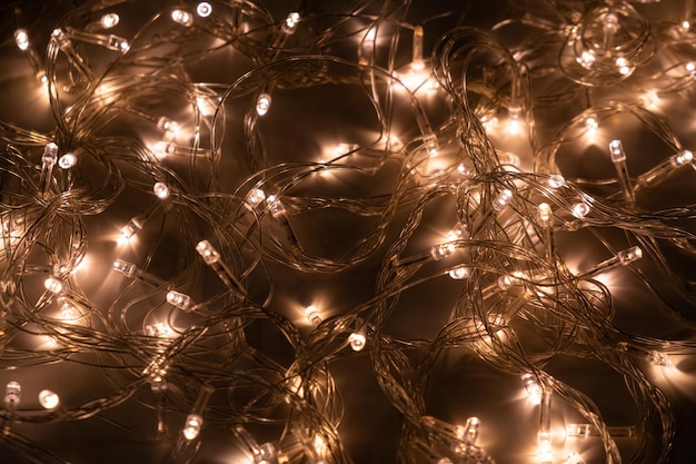 Foto textura de luzes de natal close-up. ano novo.