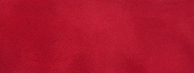 Textura de macro de fundo fosco de veludo vermelho escuro Tecido de camurça rubi com padrão Têxtil de vinho sem costura