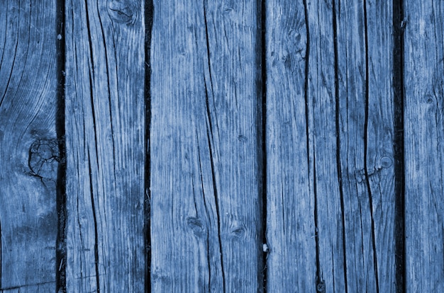 Foto textura de madeira azul com padrões naturais. cor azul clássica. cor do ano 2020. cor da moda.