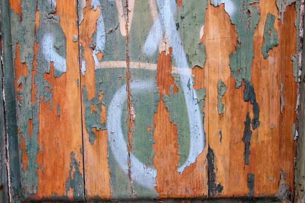 Textura de madeira velha com tinta descascada