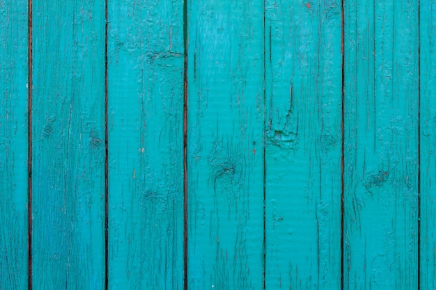 Textura de madeira velha com tinta verde gasta