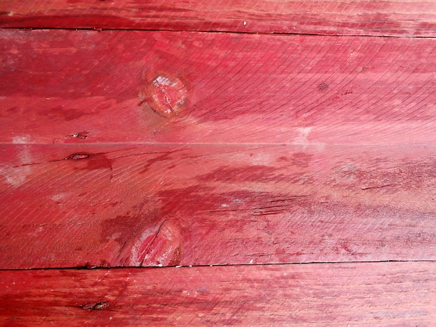 textura de madeira vermelha com fundo de grunge nós