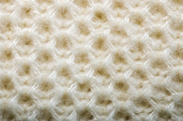 Textura de malha. tecido padrão feito de lã. fundo, espaço da cópia