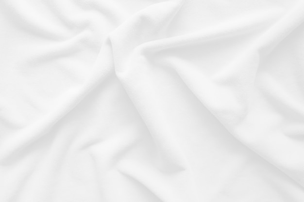Textura de manta desgrenhada branca como pano de fundo Pele fofa de tecido falso Foco suave Foco seletivo