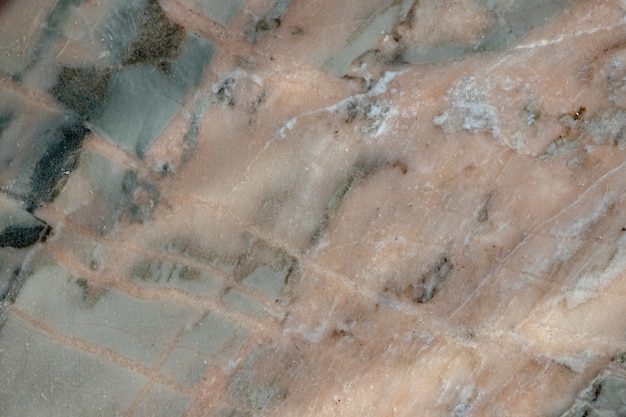Foto textura de mármore desgastada. pavimento em mosaico. fundo abstrato