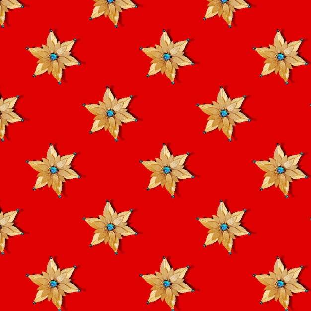 Textura de Natal sem costura de estrelas em um fundo azul Padrão