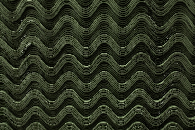 Textura de onda padrão de telhas de ardósia verde do telhado.