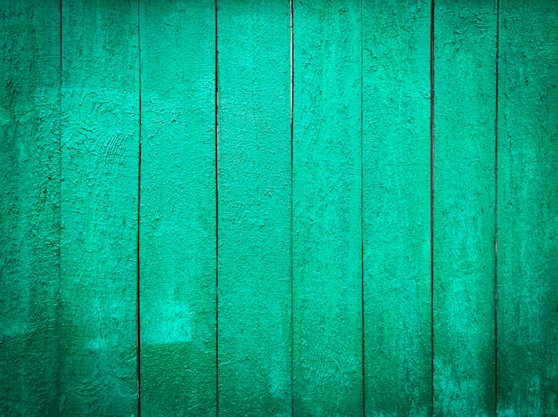 Foto textura de painel de madeira verde como parede para fundo interior ou exterior