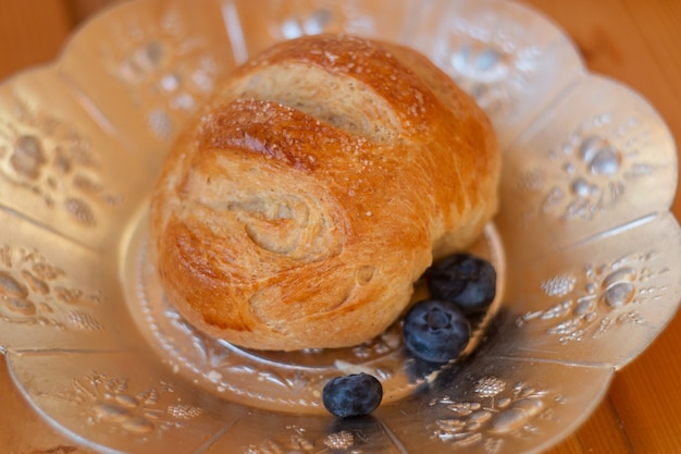 Foto textura de pão close-up pão fresco pão de fundo closeup tiro pão integral em um prato