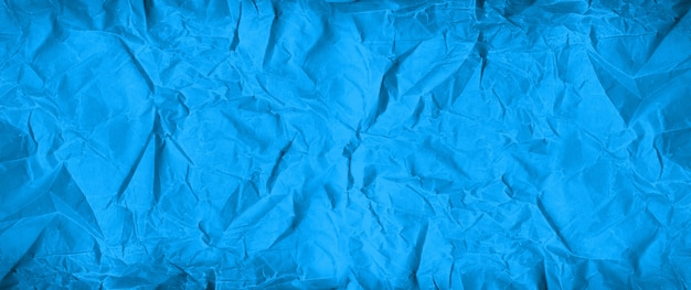 Foto textura de papel amassado azul