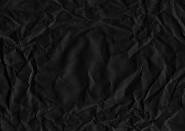 Foto textura de papel amassado. fundo de textura de papel preto amassado. textura de alta resolução.