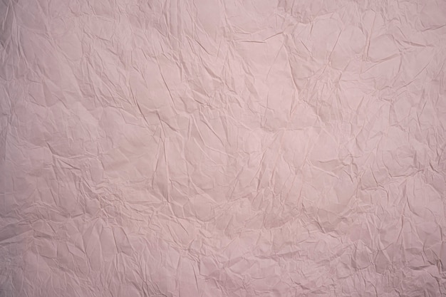 textura de papel amassado rosa de fundo