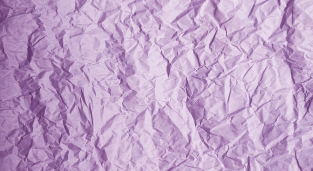 Foto textura de papel amassado roxo pastel para fundo abstrato