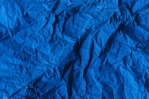 Foto textura de papel artesanal azul amassado fundo culinário à moda